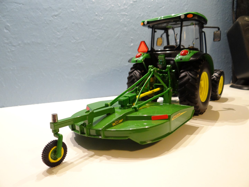 Illustration for article titled Tractor Thursday 1:16 ERTL John Deere 5095M w/ Mower